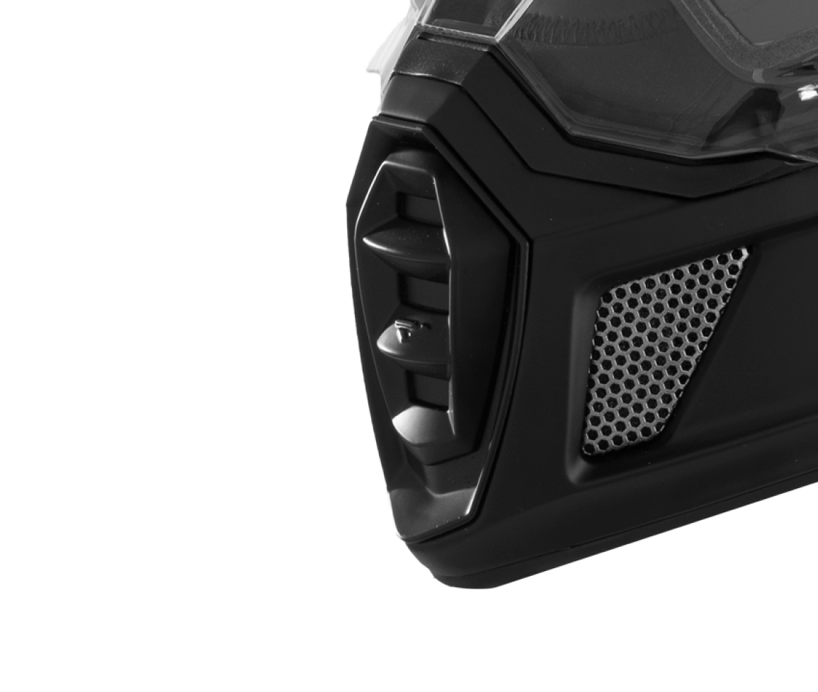 A left-side view image of Clutch X Prime helmet highlighting the integrated removable breath box and the quick release, easy adjust buckle