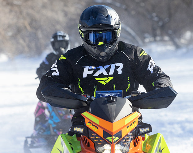 Medium shot of a guy wearing FXR's Men's Octane Jacket