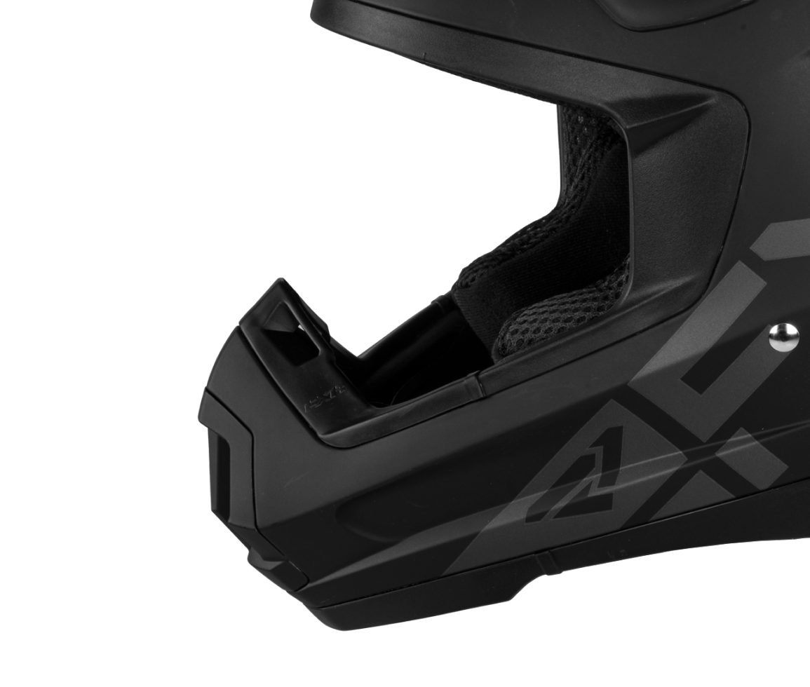 A left-side view image of Torque Prime helmet highlighting the extended rubber nose frost and roost guard